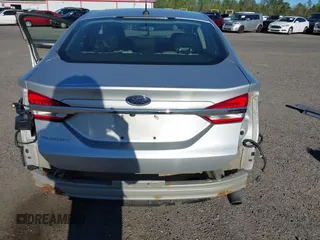 2017 Ford Fusion S with VIN 3FA6P0G76HR236209, listed as a IAAI auction lot 41799261 with 183,059 mi miles. Bid and sale history available at carsss.com. Image 6.