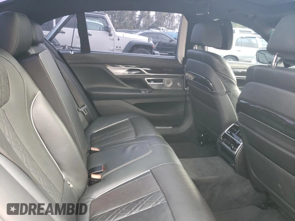 2018 BMW 7 Series 740e xDrive with VIN WBA7J2C57JG938291, listed as a Copart auction lot 58337763 with 53,259 mi miles and . Bid and sale history available at DreamBid. Image 10.