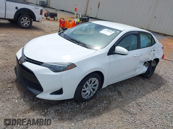 2019 Toyota Corolla L with VIN 5YFBURHE8KP949824, listed as a IAAI auction lot 41904385 with 112,054 mi miles. Bid and sale history available at carsss.com. Image 2.
