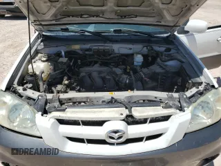 2006 Mazda Tribute S with VIN 4F2YZ04166KM12531, listed as a Copart auction lot 63354374 with 196,753 mi miles and Salvage Title. Bid and sale history available at carsss.com. Image 12.