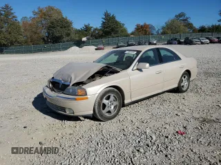 2000 Lincoln LS with VIN 1LNHM86S3YY877685, listed as a Copart auction lot 77091934 with 99,560 mi miles and Salvage Title. Bid and sale history available at carsss.com. Image 1.