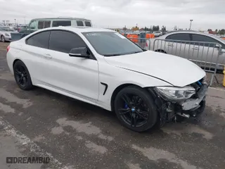 2014 BMW 4 Series 428i xDrive with VIN WBA3N5C56EK196702, listed as a IAAI auction lot 40934482 with 120,292 mi miles. Bid and sale history available at carsss.com. Image 1.