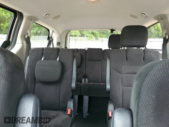 2015 Dodge Grand Caravan SXT with VIN 2C4RDGCG7FR536049, listed as a Copart auction lot 55963115 with 141,228 mi miles and Clean Title. Bid and sale history available at DreamBid. Image 10.