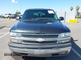 2003 Chevrolet Suburban LS with VIN 3GNEC16T63G115908, listed as a IAAI auction lot 41950165 with 202,075 mi miles. Bid and sale history available at carsss.com. Image 12.