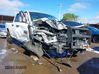 2014 Ram 2500 Tradesman z VIN 3C6TR5CT1EG234972, wystawiony jako IAAI lot #40605313 z przebiegiem 170 001 mil mil oraz . Historia ofert i sprzedaży dostępna na DreamBid. Obrazek 1.