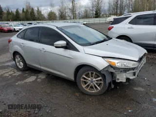 2016 Ford Focus SE with VIN 1FADP3F27GL230723, listed as a Copart auction lot 45467755 with 140,095 mi miles and Salvage title. Bid and sale history available at DreamBid. Image 4.