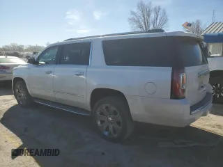 2016 GMC Yukon XL Denali with VIN 1GKS2HKJ5GR225936, listed as a Copart auction lot 49353985 with 207,658 mi miles and Salvage Title. Bid and sale history available at DreamBid. Image 2.
