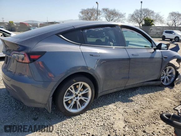 2023 Tesla Model Y Long Range with VIN 7SAYGDEE2PA164405, listed as a Copart auction lot 50085905 with 42,156 mi miles and Salvage Title. Bid and sale history available at DreamBid. Image 3.