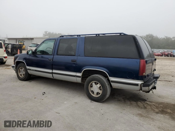 1996 Chevrolet Suburban with VIN 1GNEC16R8TJ359059, listed as a Copart auction lot 86344584 with 390,115 mi miles and Salvage Title. Bid and sale history available at carsss.com. Image 2.