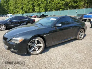 2007 BMW 6 Series M6 z VIN WBSEH93567CY24130, wystawiony jako Copart lot #59180155 z przebiegiem 143 481 mil mil oraz Czysty tytuł • Clean title. Historia ofert i sprzedaży dostępna na DreamBid. Obrazek 1.