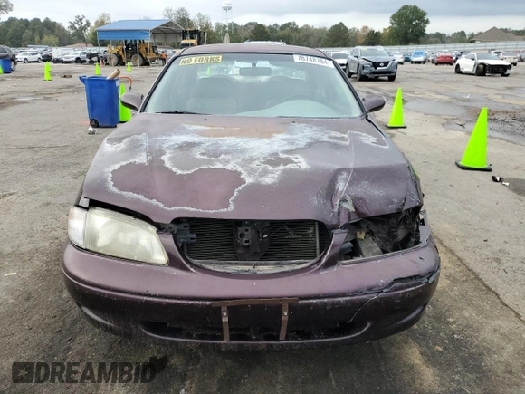 1998 Mazda 626 DX z VIN 1YVGF22CXW5775511, wystawiony jako Copart lot #78748784 z przebiegiem 158 570 mil mil oraz Szkoda całkowita • Salvage title. Historia ofert i sprzedaży dostępna na DreamBid. Obrazek 5.