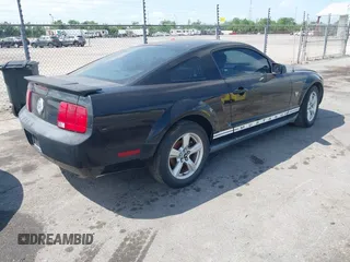 2009 Ford Mustang with VIN 1ZVHT80NX95112192, listed as a IAAI auction lot 42056743 with 141,206 mi miles and . Bid and sale history available at carsss.com. Image 4.
