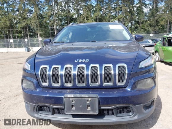2015 Jeep Cherokee Latitude with VIN 1C4PJMCB0FW702535, listed as a IAAI auction lot 42149898 with 125,938 mi miles and . Bid and sale history available at carsss.com. Image 12.