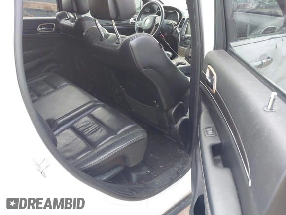 2014 Jeep Grand Cherokee Limited with VIN 1C4RJFBG5EC555128, listed as a IAAI auction lot 42129958 with 98,237 mi miles. Bid and sale history available at carsss.com. Image 8.