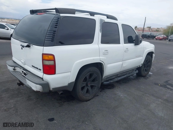 2003 Chevrolet Tahoe Z71 with VIN 1GNEK13Z03R240494, listed as a IAAI auction lot 42075566 with 203,398 mi miles. Bid and sale history available at carsss.com. Image 4.