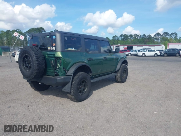 2023 Ford Bronco with VIN 1FMEE5DP5PLB15371, listed as a IAAI auction lot 41911126 with 32,091 mi miles. Bid and sale history available at carsss.com. Image 4.