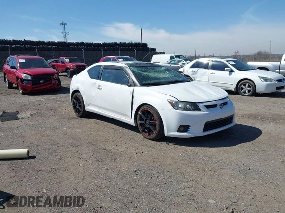 2012 Scion tC with VIN JTKJF5C7XC3029980, listed as a IAAI auction lot 41832490 with 132,140 mi miles. Bid and sale history available at carsss.com. Image 1.