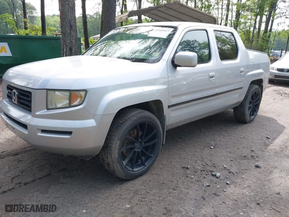 2006 Honda Ridgeline RTS with VIN 2HJYK16456H567706, listed as a IAAI auction lot 42109917 with 204,256 mi miles. Bid and sale history available at carsss.com. Image 2.