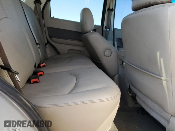 2011 Mercury Mariner Premier with VIN 4M2CN9HG4BKJ08207, listed as a Copart auction lot 54797505 with 227,898 mi miles and Salvage title. Bid and sale history available at DreamBid. Image 11.