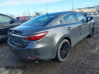 2020 Mazda 6 Grand Touring with VIN JM1GL1TY0L1521859, listed as a IAAI auction lot 41634368 with 36,709 mi miles and . Bid and sale history available at DreamBid. Image 4.