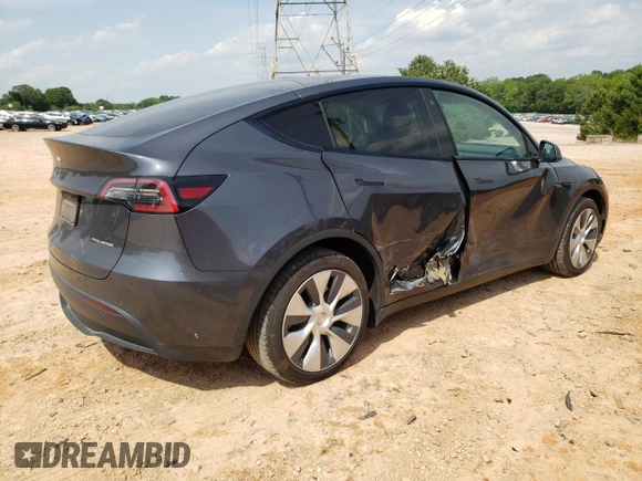 2021 Tesla Model Y Long Range z VIN 5YJYGDEE0MF263137, wystawiony jako Copart lot #57295705 z przebiegiem 63 627 mil mil oraz Szkoda całkowita • Salvage title. Historia ofert i sprzedaży dostępna na DreamBid. Obrazek 3.