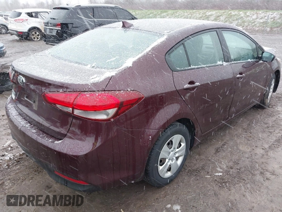 2017 Kia Forte LX with VIN 3KPFK4A7XHE071992, listed as a IAAI auction lot 42039101 with 76,682 mi miles. Bid and sale history available at carsss.com. Image 4.