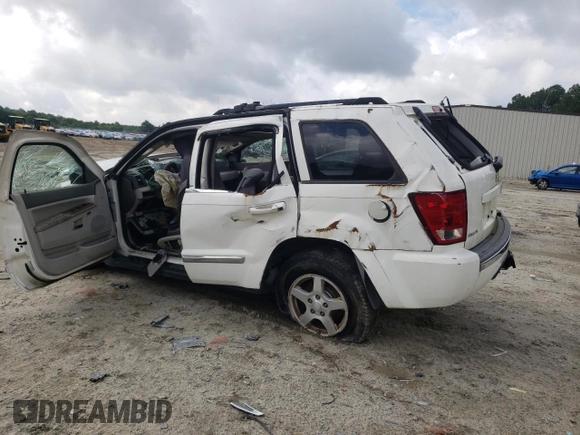 2005 Jeep Grand Cherokee Limited with VIN 1J8HR58N35C575343, listed as a Copart auction lot 57079695 with 143,772 mi miles and Salvage title. Bid and sale history available at DreamBid. Image 2.