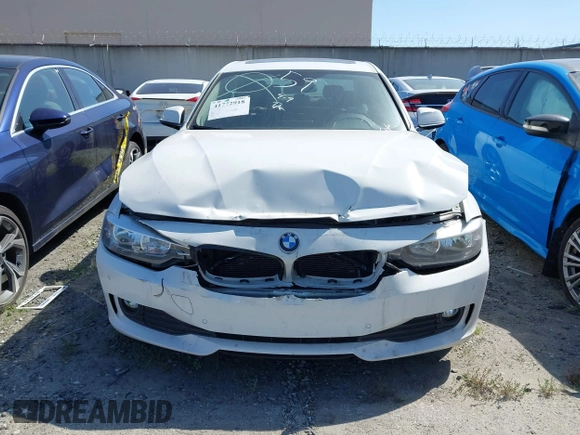 2015 BMW 3 Series 320i with VIN WBA3B1G56FNT06434, listed as a IAAI auction lot 41772918 with 76,782 mi miles. Bid and sale history available at carsss.com. Image 13.