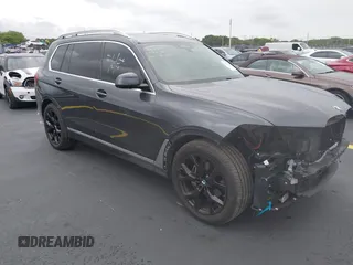 2019 BMW X7 xDrive40i z VIN 5UXCW2C56KL081312, wystawiony jako IAAI lot #42151232 z przebiegiem 90 831 mil mil oraz . Historia ofert i sprzedaży dostępna na DreamBid. Obrazek 1.