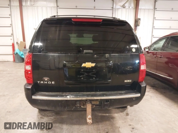 2012 Chevrolet Tahoe LTZ with VIN 1GNSKCE02CR297261, listed as a IAAI auction lot 40255137 with 283,110 mi miles and . Bid and sale history available at DreamBid. Image 17.