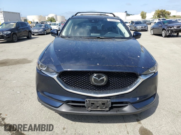 2018 Mazda CX-5 Touring with VIN JM3KFACM6J1323449, listed as a Copart auction lot 54090445 with 93,748 mi miles and Salvage Title. Bid and sale history available at carsss.com. Image 5.