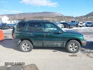 2004 Chevrolet Tracker with VIN 2CNBJ134146904071, listed as a IAAI auction lot 41618326 with 154,814 mi miles and . Bid and sale history available at DreamBid. Image 12.