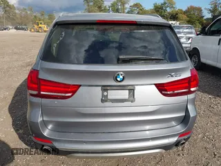 2014 BMW X5 xDrive35i with VIN 5UXKR0C52E0K50710, listed as a IAAI auction lot 40529606 with 114,307 mi miles. Bid and sale history available at carsss.com. Image 16.