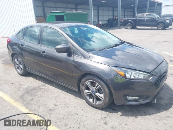 2018 Ford Focus SE with VIN 1FADP3FE2JL263954, listed as a IAAI auction lot 42480748 with 111,059 mi miles and . Bid and sale history available at DreamBid. Image 1.
