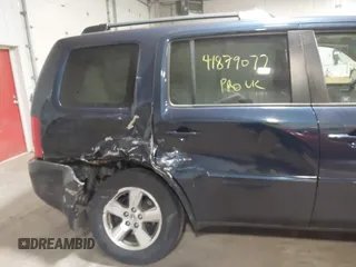 2011 Honda Pilot EX-L with VIN 5FNYF4H54BB043205, listed as a IAAI auction lot 41879077 with 240,108 mi miles. Bid and sale history available at carsss.com. Image 6.