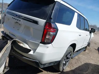 2021 Chevrolet Tahoe Z71 with VIN 1GNSKPKD7MR117286, listed as a IAAI auction lot 41778088 with 87,938 mi miles and . Bid and sale history available at DreamBid. Image 4.