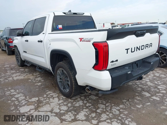 2023 Toyota Tundra SR5 with VIN 5TFLA5DB0PX077679, listed as a IAAI auction lot 42354545 with 31,838 mi miles and . Bid and sale history available at DreamBid. Image 3.