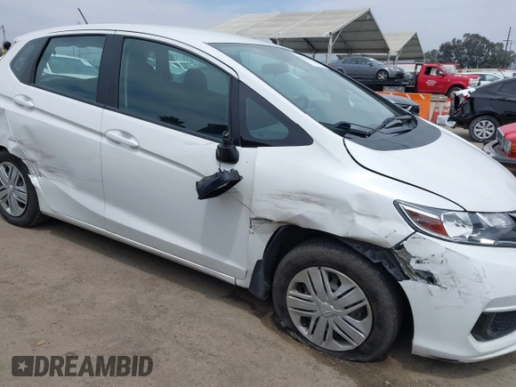 2020 Honda Fit LX with VIN 3HGGK5H44LM718313, listed as a IAAI auction lot 42358302 with 63,964 mi miles and . Bid and sale history available at DreamBid. Image 6.