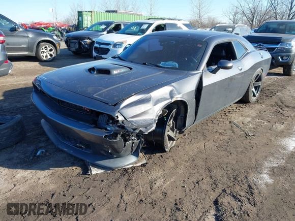 2016 Dodge Challenger R/T Scat Pack z VIN 2C3CDZFJ1GH249729, wystawiony jako IAAI lot #41589369 z przebiegiem 44 555 mil mil oraz . Historia ofert i sprzedaży dostępna na DreamBid. Obrazek 2.