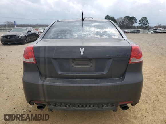 2009 Pontiac G8 z VIN 6G2ER57709L240146, wystawiony jako Copart lot #49223415 z przebiegiem 203 008 mil mil oraz Czysty tytuł • Clean title. Historia ofert i sprzedaży dostępna na DreamBid. Obrazek 6.