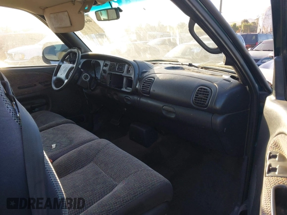 1999 Dodge Ram 2500 with VIN 3B7KC23Z5XG118959, listed as a IAAI auction lot 40484594 with 176,946 mi miles. Bid and sale history available at carsss.com. Image 5.
