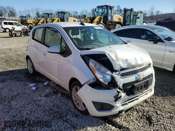 2015 Chevrolet Spark LS with VIN KL8CB6S97FC740974, listed as a Copart auction lot 86613484 with 72,401 mi miles and Salvage Title. Bid and sale history available at DreamBid. Image 4.