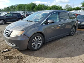 2014 Honda Odyssey Touring с VIN 5FNRL5H93EB048132, выставлен на аукционе Copart как лот 56800495 с пробегом 306 950 миль миль и Чистый • Clean title. История ставок и продаж доступна на DreamBid. Изображение 1.