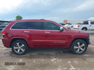 2015 Jeep Grand Cherokee Overland z VIN 1C4RJFCT1FC198611, wystawiony jako IAAI lot #42427311 z przebiegiem 116 140 mil mil oraz . Historia ofert i sprzedaży dostępna na DreamBid. Obrazek 14.