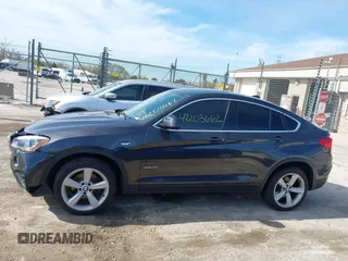 2017 BMW X4 xDrive28i with VIN 5UXXW3C36H0T79679, listed as a IAAI auction lot 42203662 with 137,863 mi miles and . Bid and sale history available at DreamBid. Image 14.