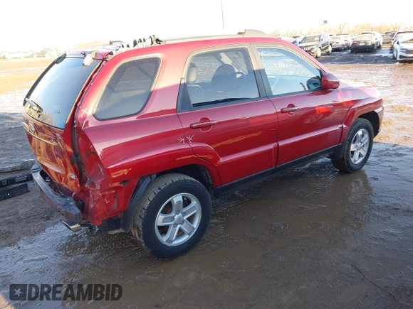 2009 Kia Sportage LX with VIN KNDJE723997634014, listed as a IAAI auction lot 41452224 with 148,643 mi miles. Bid and sale history available at carsss.com. Image 4.