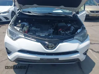 2018 Toyota RAV4 XLE z VIN 2T3WFREV1JW459553, wystawiony jako IAAI lot #42423474 z przebiegiem 129 523 mil mil oraz . Historia ofert i sprzedaży dostępna na DreamBid. Obrazek 10.