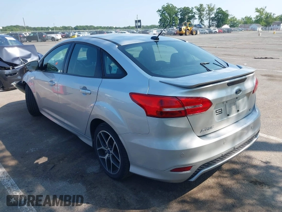 2015 Ford Focus SE with VIN 1FADP3F25FL381008, listed as a IAAI auction lot 42413322 with 106,353 mi miles and . Bid and sale history available at DreamBid. Image 3.