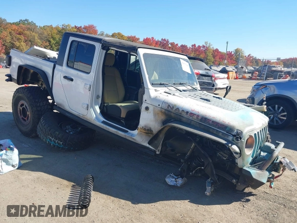 2020 Jeep Gladiator Sport S with VIN 1C6HJTAG3LL109494, listed as a IAAI auction lot 40677949 with 52,079 mi miles and . Bid and sale history available at DreamBid. Image 1.