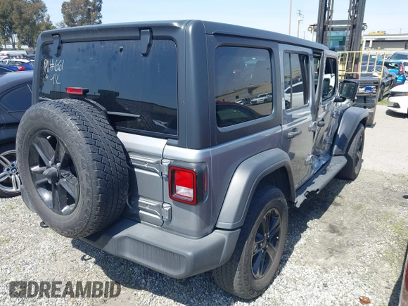 2021 Jeep Wrangler Unlimited Sport Altitude with VIN 1C4HJXDGXMW662493, listed as a IAAI auction lot 41288957 with 64,808 mi miles and . Bid and sale history available at DreamBid. Image 4.
